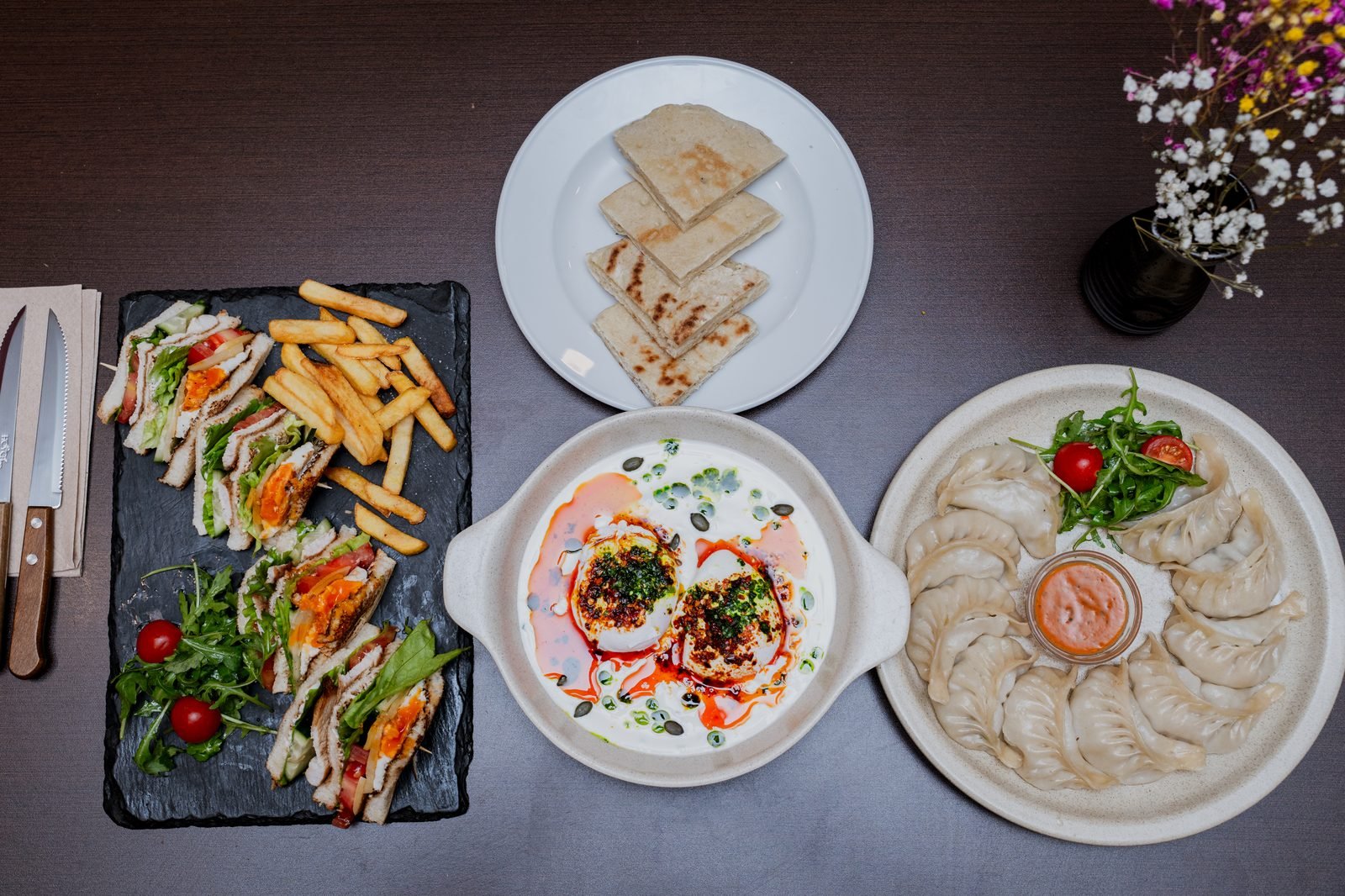 A spread of Trisara dishes on the table