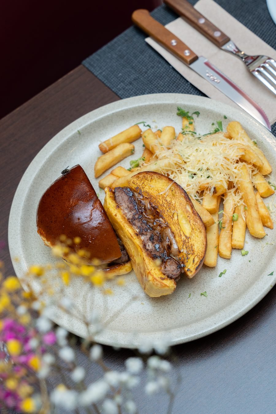 Burger and fries at Trisara